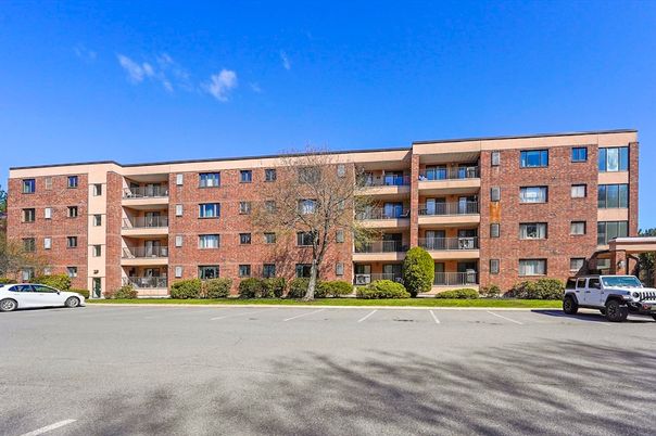Exterior, Facade, Brick Facade, Condo Building