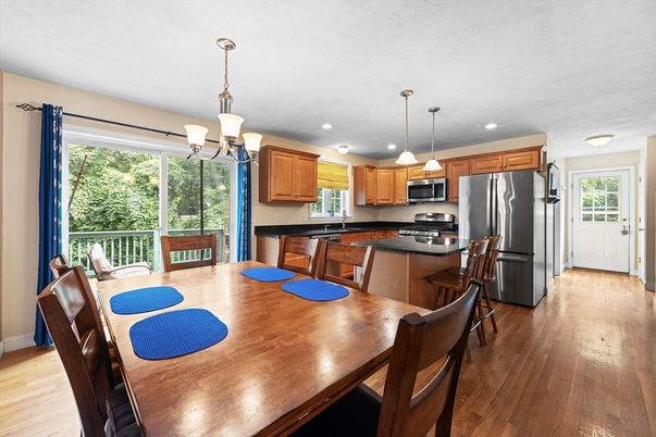Chandelier, Dining room, Interior, Kitchen, Pendant Lights, Recessed Lighting, Stainless Steel Appliances, Wood Texture Flooring