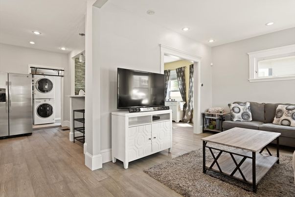 Interior, Living room, Recessed Lighting, Utility Closets, Washer, Wood Texture Flooring