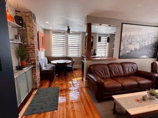 Dining room, Interior, Living room, Recessed Lighting, Stone Walls, Wood Texture Flooring