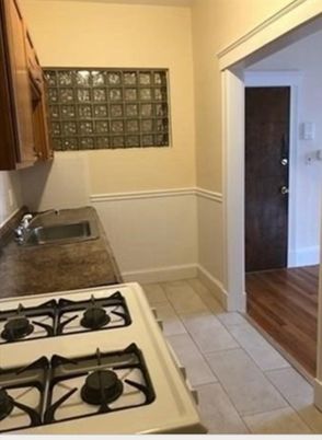Interior, Kitchen, Tile Countertops, Wood Texture Flooring