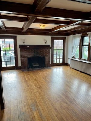 Empty room, Fireplace, Interior, Stone Walls, Wooden Beams, Wood Texture Flooring