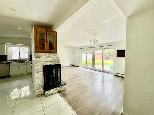 Chandelier, Empty room, Fireplace, Interior, Marble, Recessed Lighting, Wood Texture Flooring