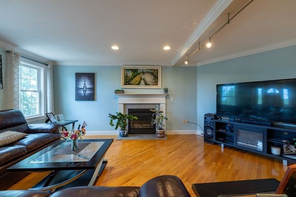 Fireplace, Interior, Living room, Recessed Lighting, Wood Texture Flooring