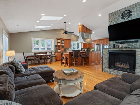Dining room, Fireplace, Interior, Kitchen, Living room, Recessed Lighting, Stone Walls, Wood Texture Flooring