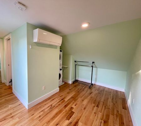 Empty room, Interior, Recessed Lighting, Utility Closets, Washer, Wood Texture Flooring