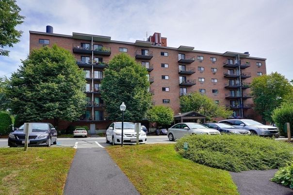 Exterior, Facade, Brick Facade, Condo Building