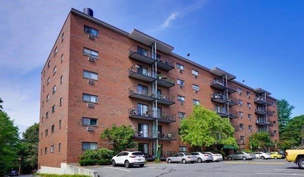 Exterior, Facade, Brick Facade, Condo Building