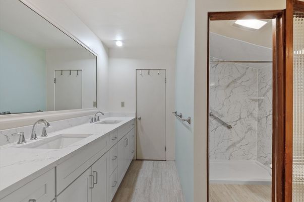 Bathroom, Dual Sink Vanities, Interior, Marble Walls, Recessed Lighting