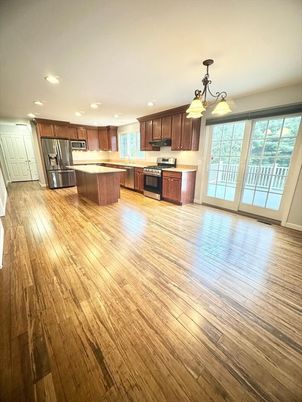 Chandelier, Interior, Kitchen, Pendant Lights, Recessed Lighting, Stainless Steel Appliances, Wood Texture Flooring