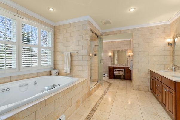Bathroom, Dual Sink Vanities, Glass Shower, Interior, Recessed Lighting, Stone Walls