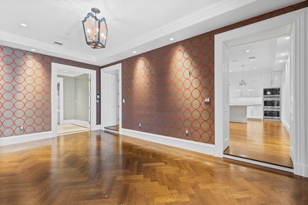 Empty room, Interior, Kitchen, Pendant Lights, Recessed Lighting, Stainless Steel Appliances, Stone Walls, Wood Texture Flooring
