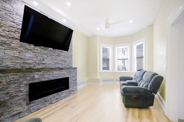 Fireplace, Interior, Recessed Lighting, Stone Walls, Wood Texture Flooring