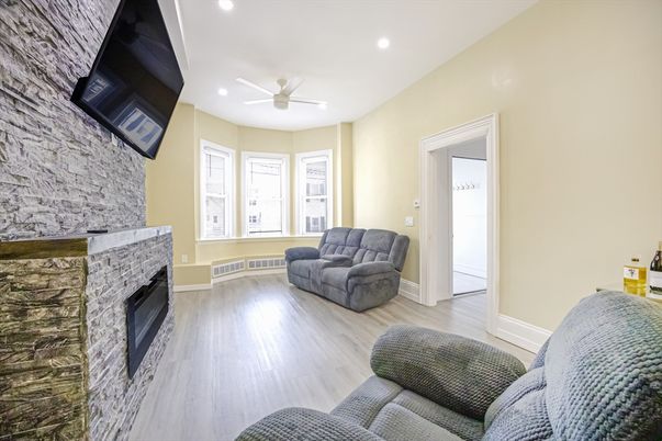 Fireplace, Interior, Recessed Lighting, Stone Walls, Wood Texture Flooring