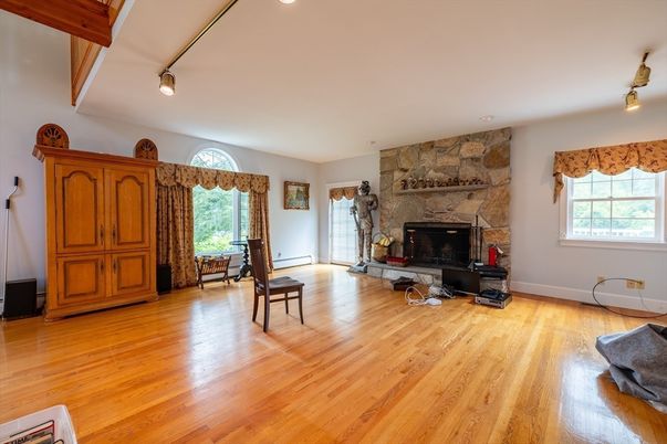 Fireplace, Interior, Recessed Lighting, Stone Walls, Wood Texture Flooring