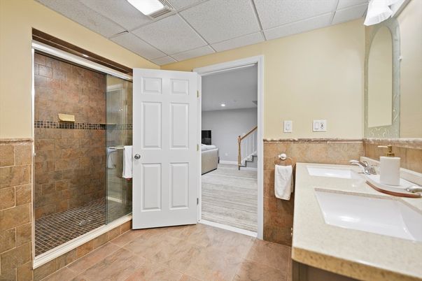 Bathroom, Glass Shower, Interior, Recessed Lighting, Stone Walls