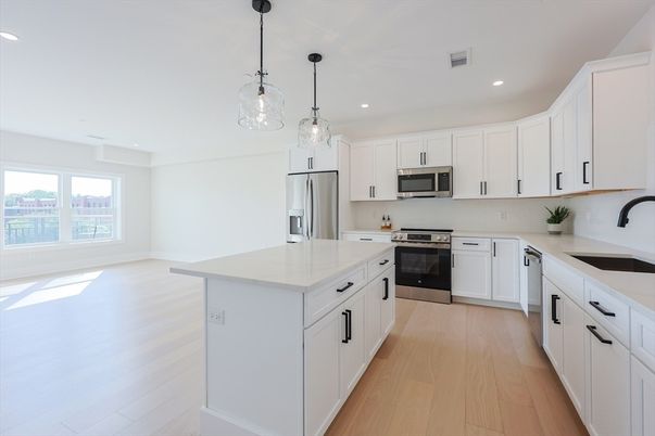 Interior, Kitchen, Pendant Lights, Recessed Lighting, Stainless Steel Appliances, Wood Texture Flooring