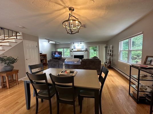 Dining room, Fireplace, Interior, Living room, Pendant Lights, Wood Texture Flooring
