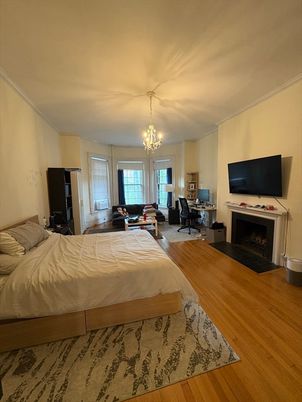 Bedroom, Chandelier, Fireplace, Interior, Wood Texture Flooring