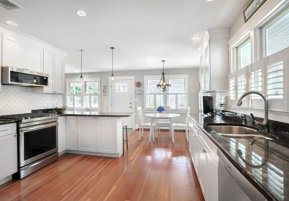 Dining room, Interior, Kitchen, Pendant Lights, Recessed Lighting, Stainless Steel Appliances, Wood Texture Flooring
