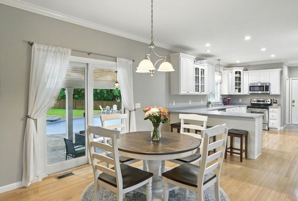 Dining room, Interior, Kitchen, Pendant Lights, Recessed Lighting, Stainless Steel Appliances, Wood Texture Flooring