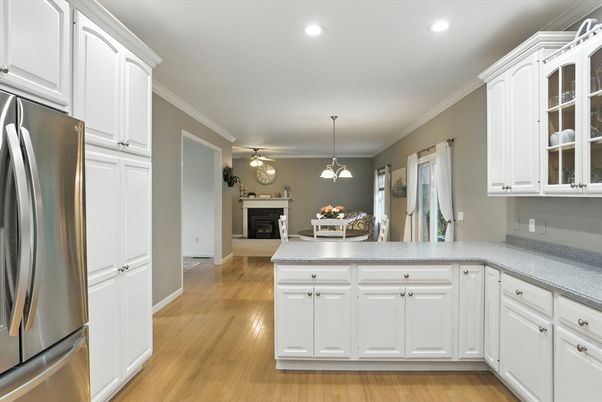 Fireplace, Interior, Kitchen, Pendant Lights, Recessed Lighting, Stainless Steel Appliances, Wood Texture Flooring