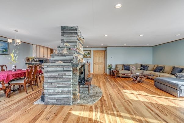 Dining room, Fireplace, Interior, Living room, Pendant Lights, Recessed Lighting, Wood Texture Flooring