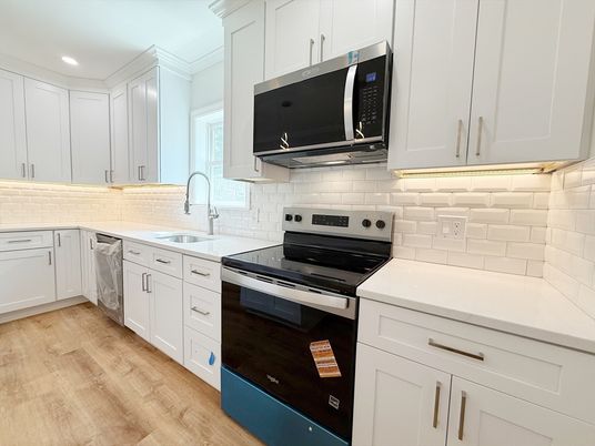 Interior, Kitchen, Recessed Lighting, Stainless Steel Appliances, Wood Texture Flooring