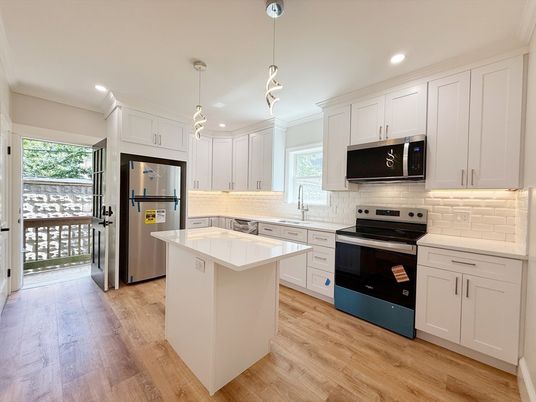 Interior, Kitchen, Pendant Lights, Recessed Lighting, Stainless Steel Appliances, Wood Texture Flooring