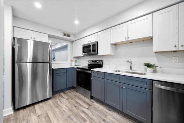 Interior, Kitchen, Recessed Lighting, Stainless Steel Appliances, Wood Texture Flooring