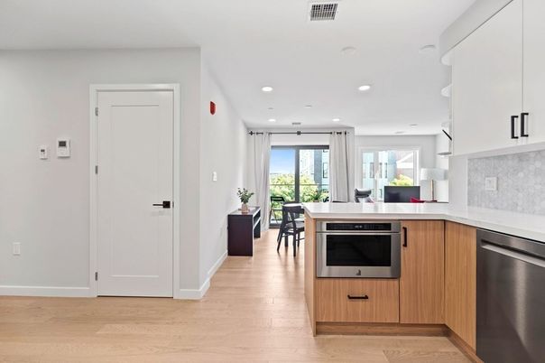 Dining room, Interior, Kitchen, Recessed Lighting, Stainless Steel Appliances, Wood Texture Flooring