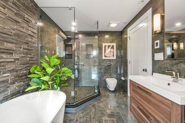 Bathroom, Dual Sink Vanities, Free Standing Baths, Glass Shower, Interior, Recessed Lighting, Stone Walls