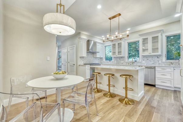Dining room, Interior, Kitchen, Pendant Lights, Recessed Lighting, Stainless Steel Appliances, Wood Texture Flooring