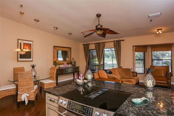 Dining room, Interior, Kitchen, Living room, Pendant Lights, Recessed Lighting, Stainless Steel Appliances, Wood Texture Flooring