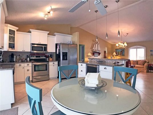 Chandelier, Dining room, Interior, Kitchen, Living room, Pendant Lights, Stainless Steel Appliances