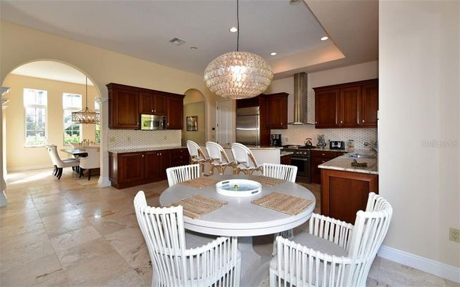 Chandelier, Dining room, Interior, Kitchen, Pendant Lights, Recessed Lighting, Stainless Steel Appliances