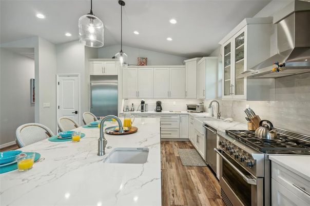 Interior, Kitchen, Pendant Lights, Recessed Lighting, Stainless Steel Appliances, Wood Texture Flooring