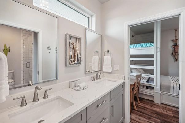 Bathroom, Dual Sink Vanities, Glass Shower, Interior, Wood Texture Flooring