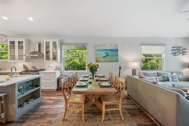 Dining room, Interior, Kitchen, Living room, Recessed Lighting, Stainless Steel Appliances, Wood Texture Flooring
