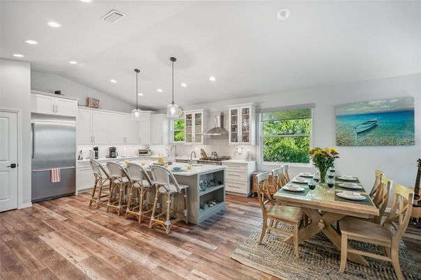 Dining room, Interior, Kitchen, Pendant Lights, Recessed Lighting, Stainless Steel Appliances, Wood Texture Flooring