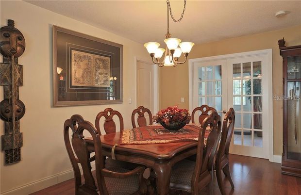 Chandelier, Dining room, Interior, Wood Texture Flooring