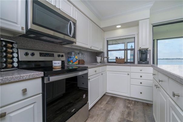 Interior, Kitchen, Recessed Lighting, Stainless Steel Appliances, Water, Wood Texture Flooring