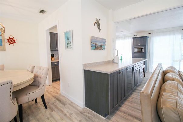 Interior, Kitchen, Wood Texture Flooring, Stainless Steel Appliances