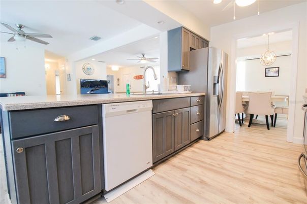 Interior, Kitchen, Wood Texture Flooring, Living room, Dining room, Stainless Steel Appliances, Pendant Lights