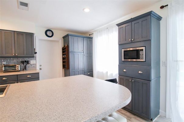 Interior, Kitchen, Wood Texture Flooring, Recessed Lighting, Ceramic Tile