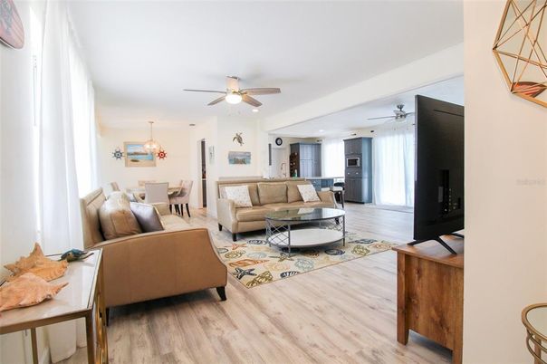 Interior, Kitchen, Wood Texture Flooring, Recessed Lighting, Living room, Dining room, Chandelier, Pendant Lights