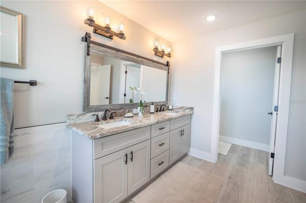 Bathroom, Dual Sink Vanities, Interior, Recessed Lighting, Wood Texture Flooring