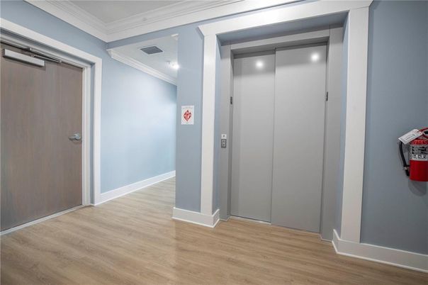 Elevator, Interior, Recessed Lighting, Wood Texture Flooring