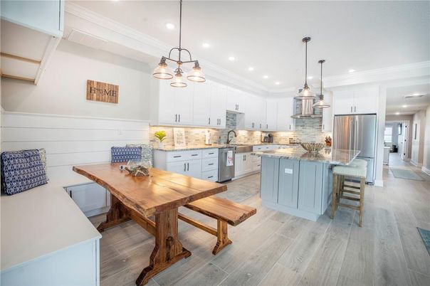 Dining room, Interior, Kitchen, Pendant Lights, Recessed Lighting, Stainless Steel Appliances, Wood Texture Flooring