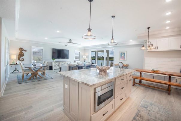 Dining room, Interior, Kitchen, Living room, Pendant Lights, Recessed Lighting, Wood Texture Flooring